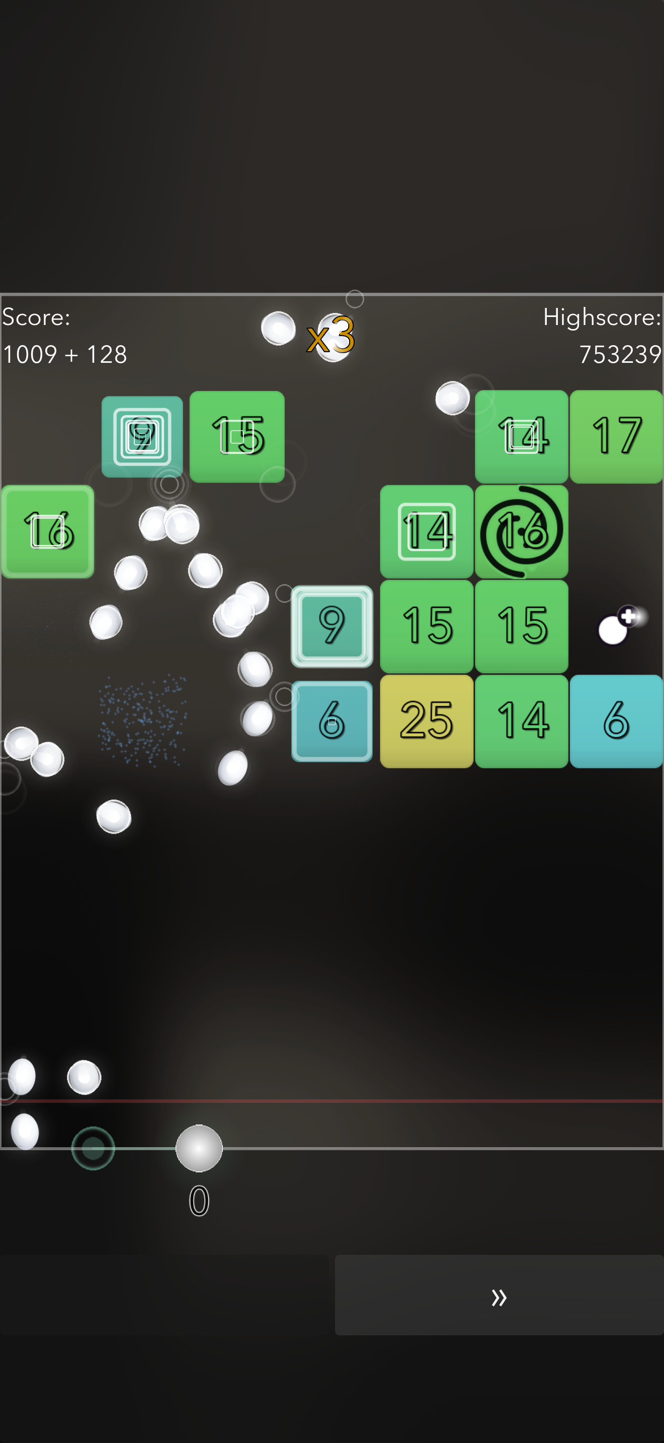 Zen Brick gameplay — a board of colourful numbered bricks with balls in flight